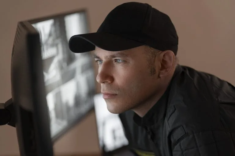 portrait male security guard with uniform min