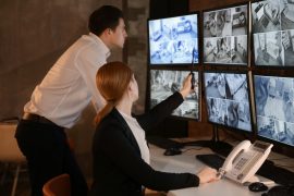 security-guards-working-surveillance-room-min